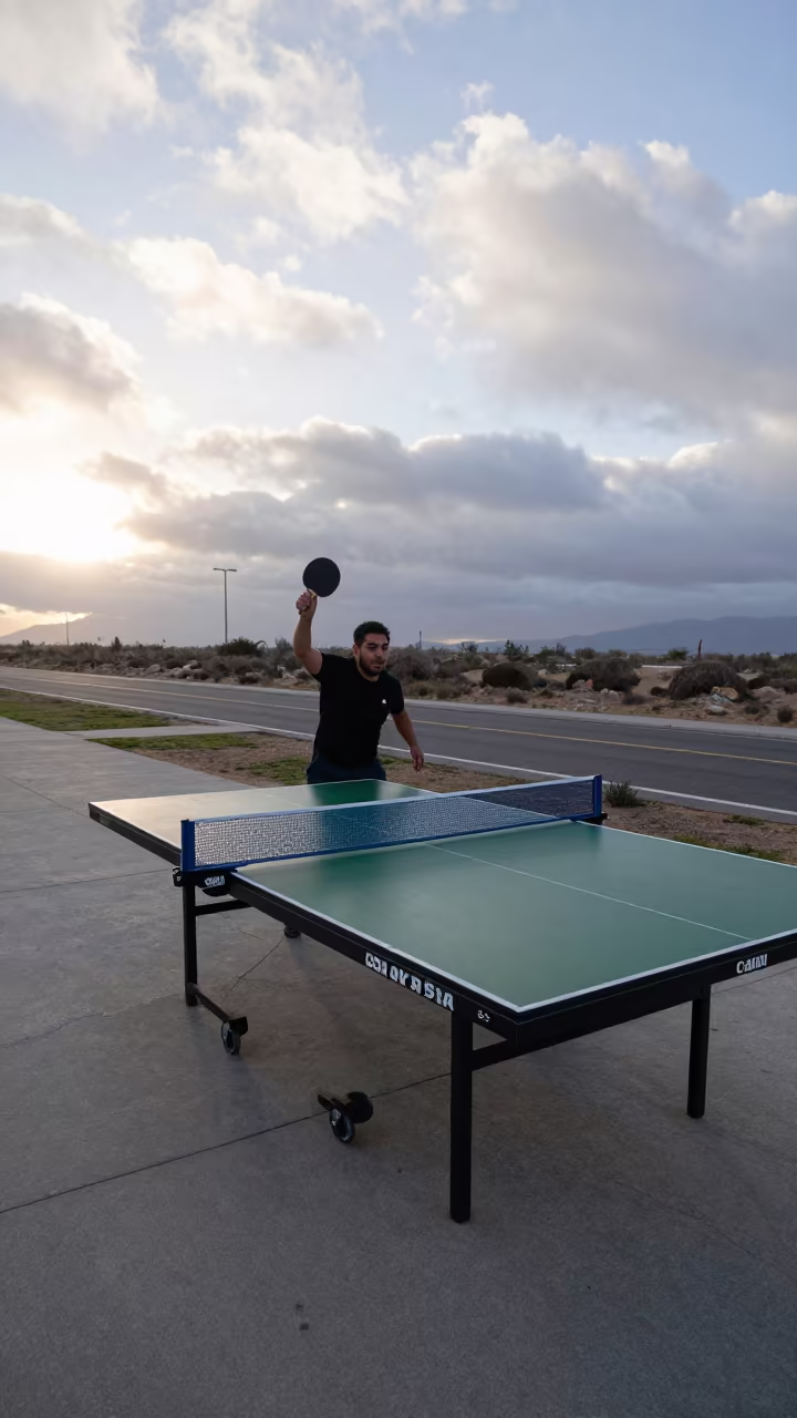 Table Tennis Player Serving Before Sunrise in at a roadside stop near Ensenada