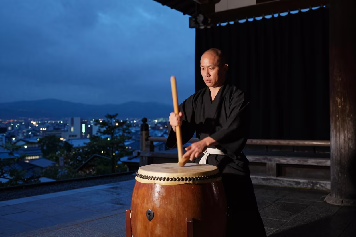 Taiko Drummer Under Indigo Temple Lights in in a temple precinct in Kanazawa