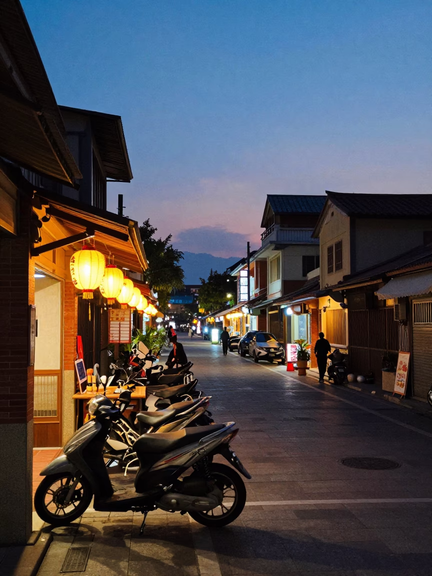 Tainan Taiwan Street Scene at Dusk with Motorcycles and Lanterns in in Tainan, Taiwan
