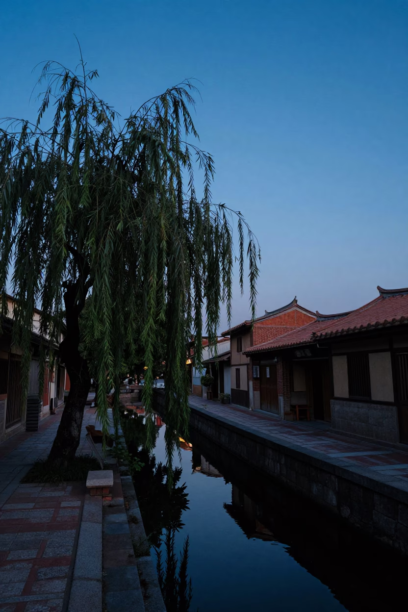 Tainan Taiwan Twilight Street Scene with Weeping Willow and Traditional Architecture in in Tainan, Taiwan
