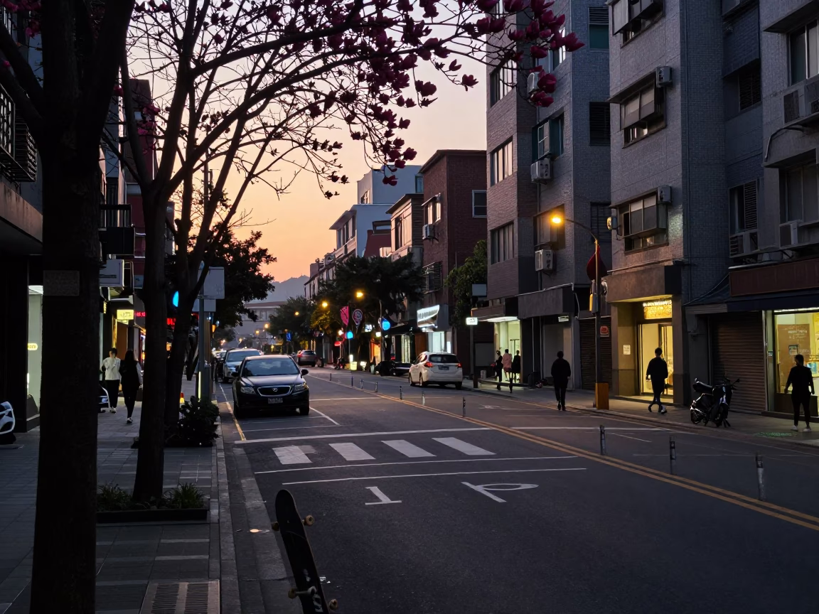 Taipei Street Scene Before Dawn with Skateboard and Magnolia Bloom in in Taipei, Taiwan