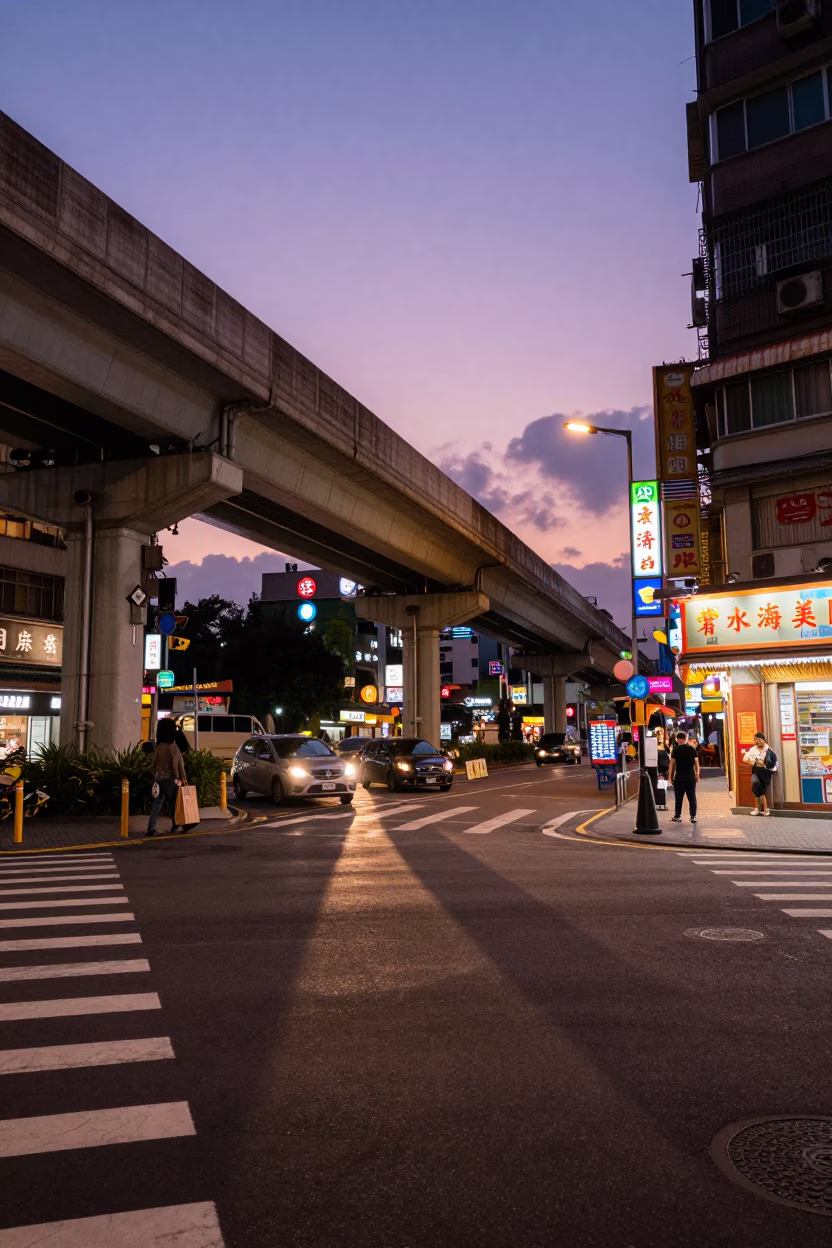 Taipei Street Scene Early Evening with Neon Signs and Overpass Ramp in in Taipei, Taiwan