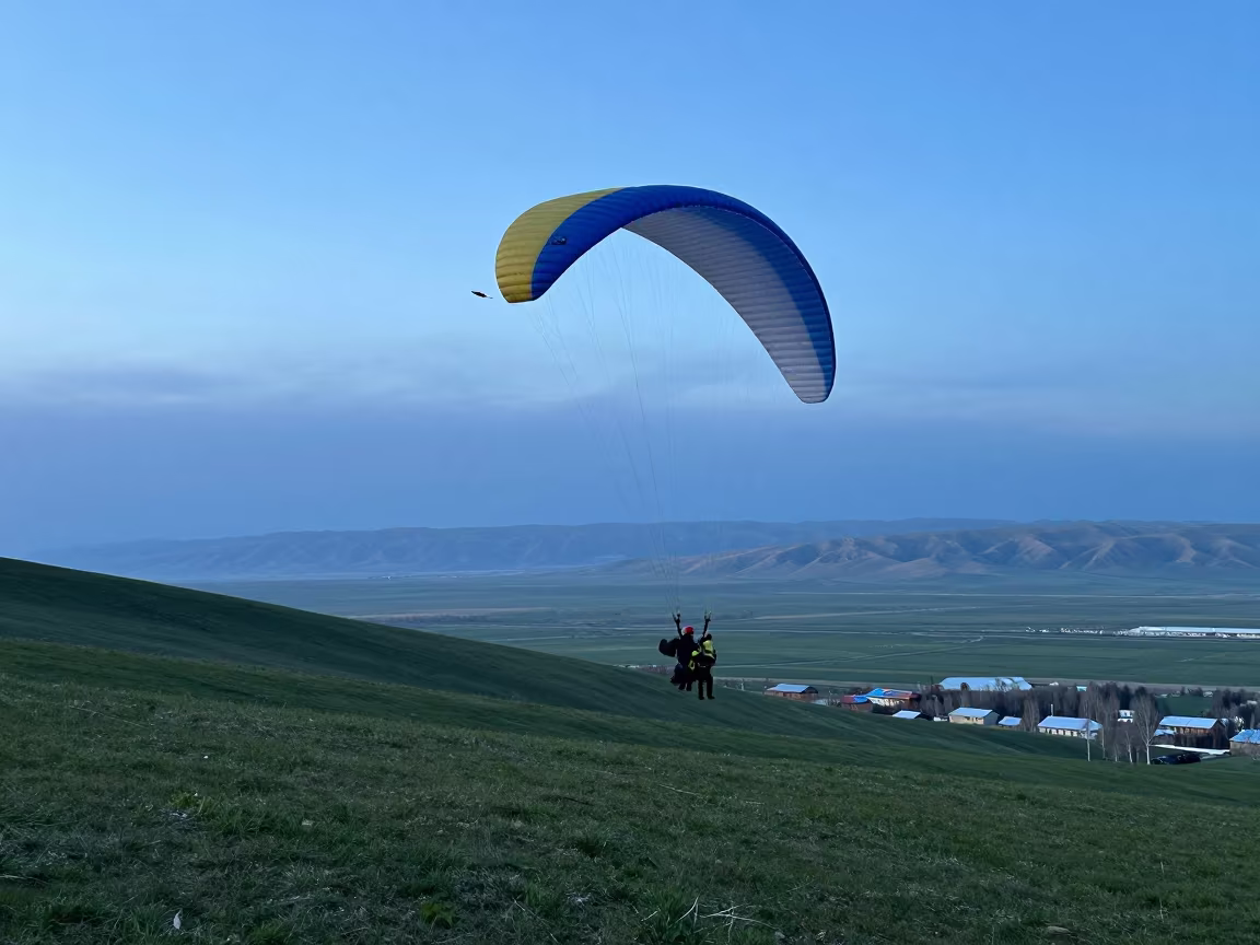 Tandem Paraglider Over Bishkek Valley Twilight in near open fields near Bishkek