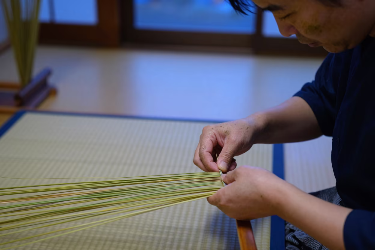 Tatami Weaver Rush Stains Evening Portrait in inside a textile atelier in Kamakura