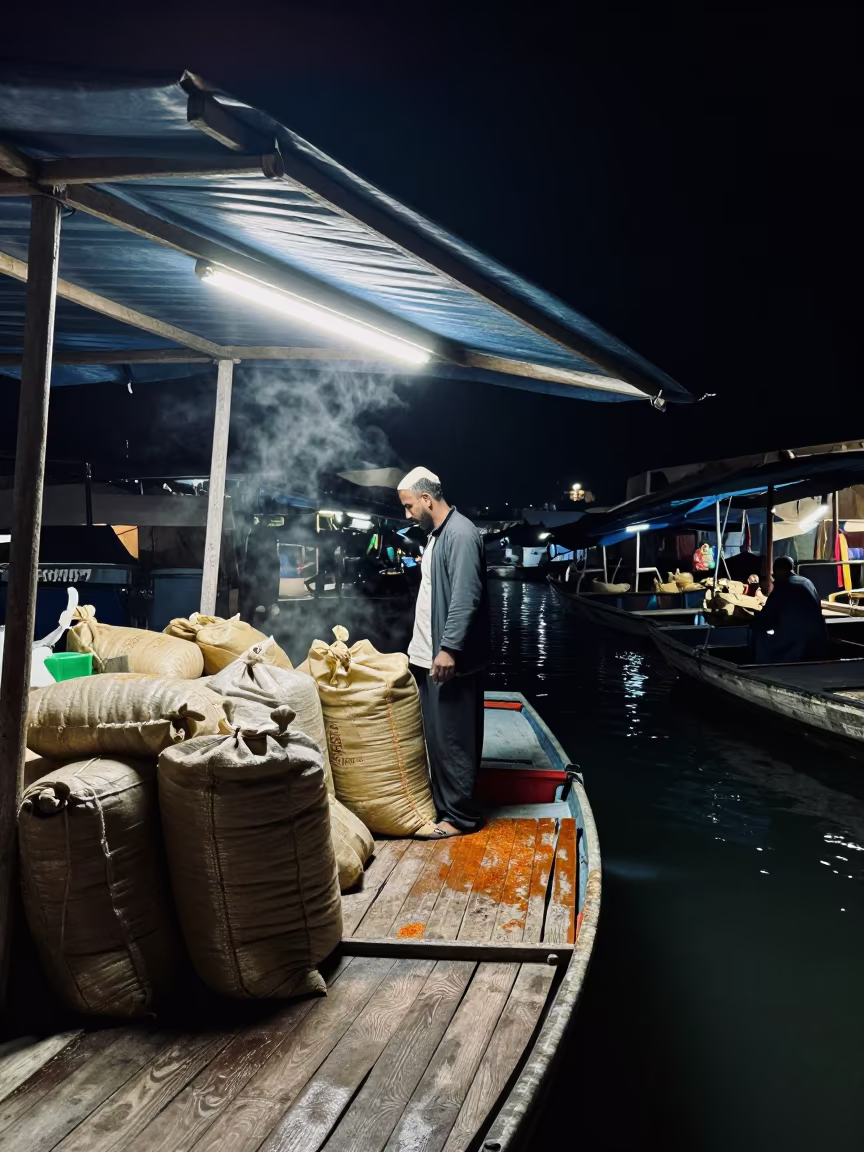 Tea Hawker Night Boat Mostaganem in at a floating market boat in Mostaganem
