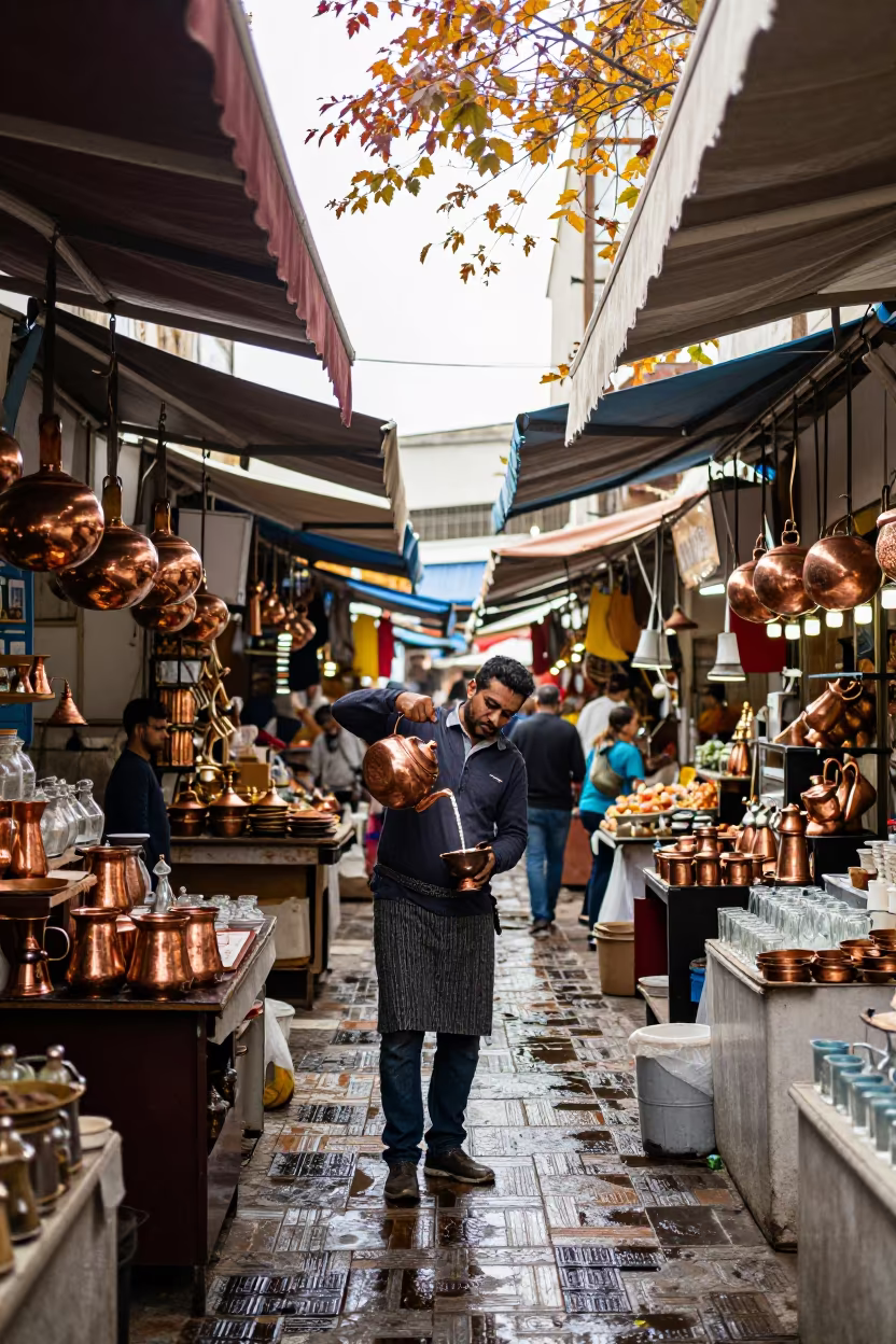 Tea Vendor Pouring Height Moroccan Bazaar Florianopolis in in a covered bazaar aisle in Florianopolis