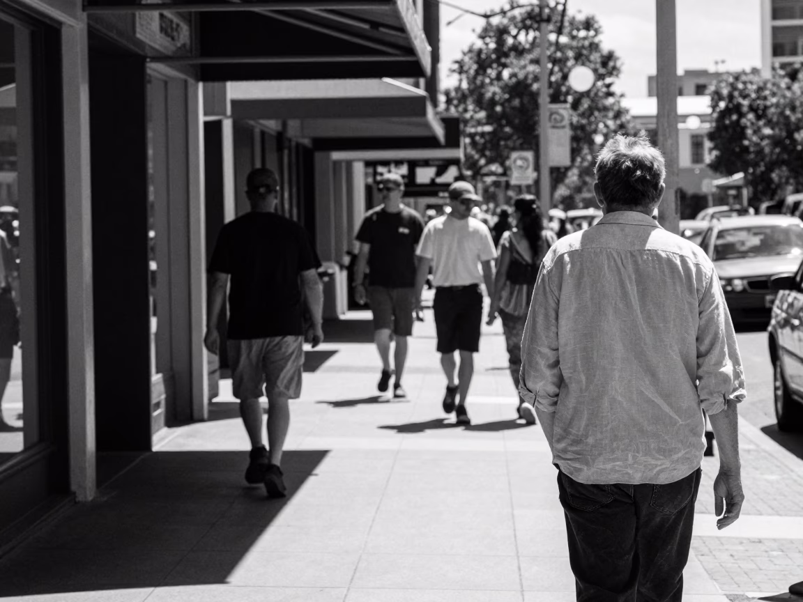 The Flat Glare Of Noon Light on Casual Pedestrians in Perth in in Perth, Western Australia, Australia