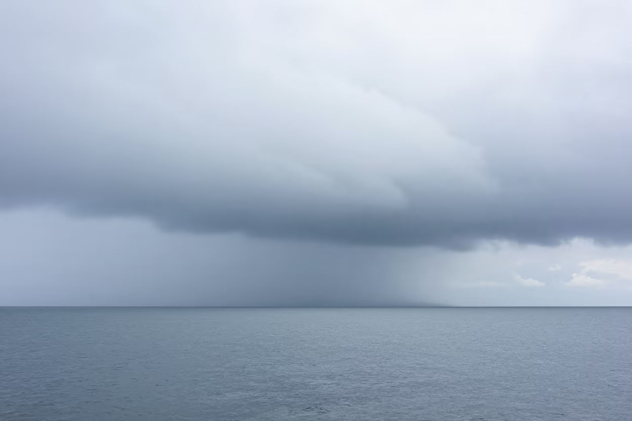 Thunder Cell Rising Over Croatian Sea Fog in through low marine fog in Croatia