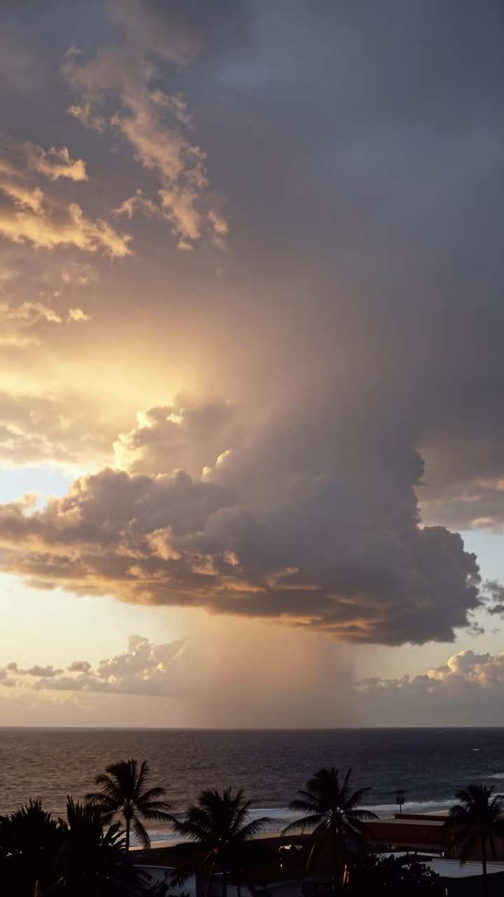 Thunder Tower Over Tropical Ocean Near Gracia Barcelona in beneath fast-moving cloud bands near Gracia, Barcelona