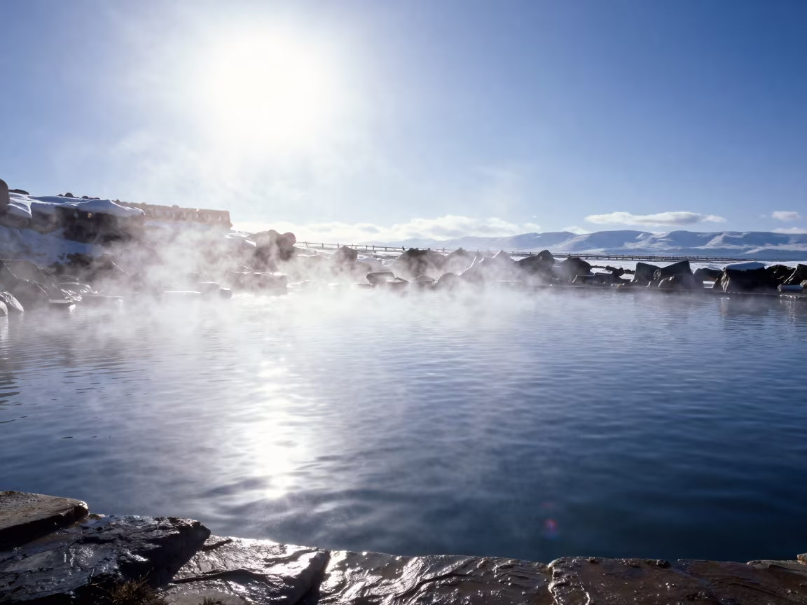 Tibetan Hot Spring Pool with Snow and Mist in in Tibet