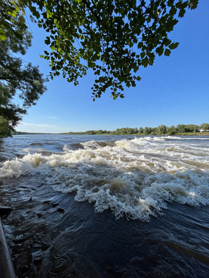 Tidal Bore Wave Rushing Up River Under Noon in near Abakan