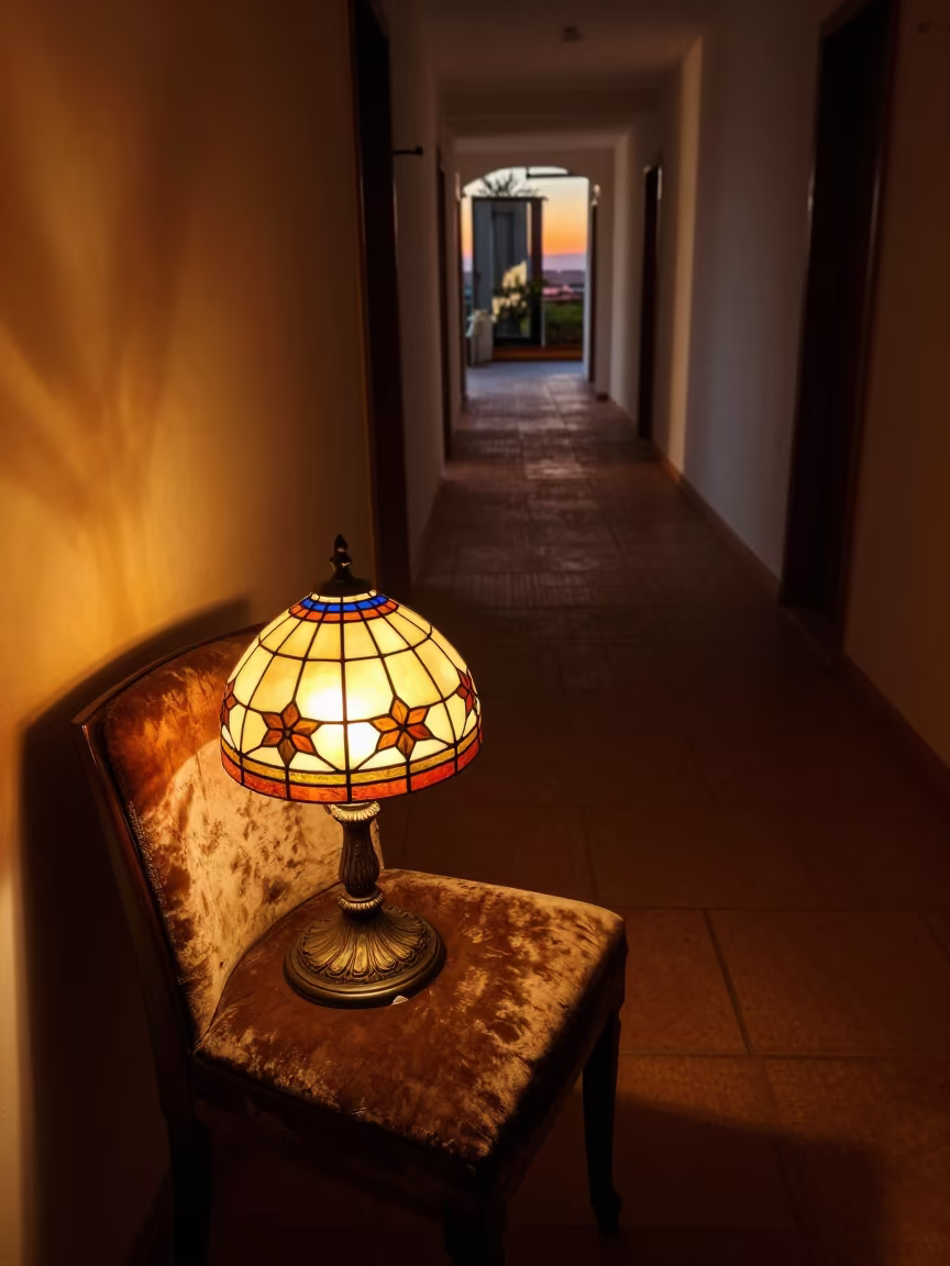 Tiffany Lamp Glowing on Velvet Chair Near Berat in on a velvet chair near Berat