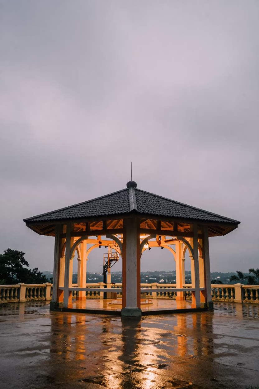 Timber Pavilion Overlooking Ipoh Train Terminal at Dusk in inside a restored train terminal near Ipoh