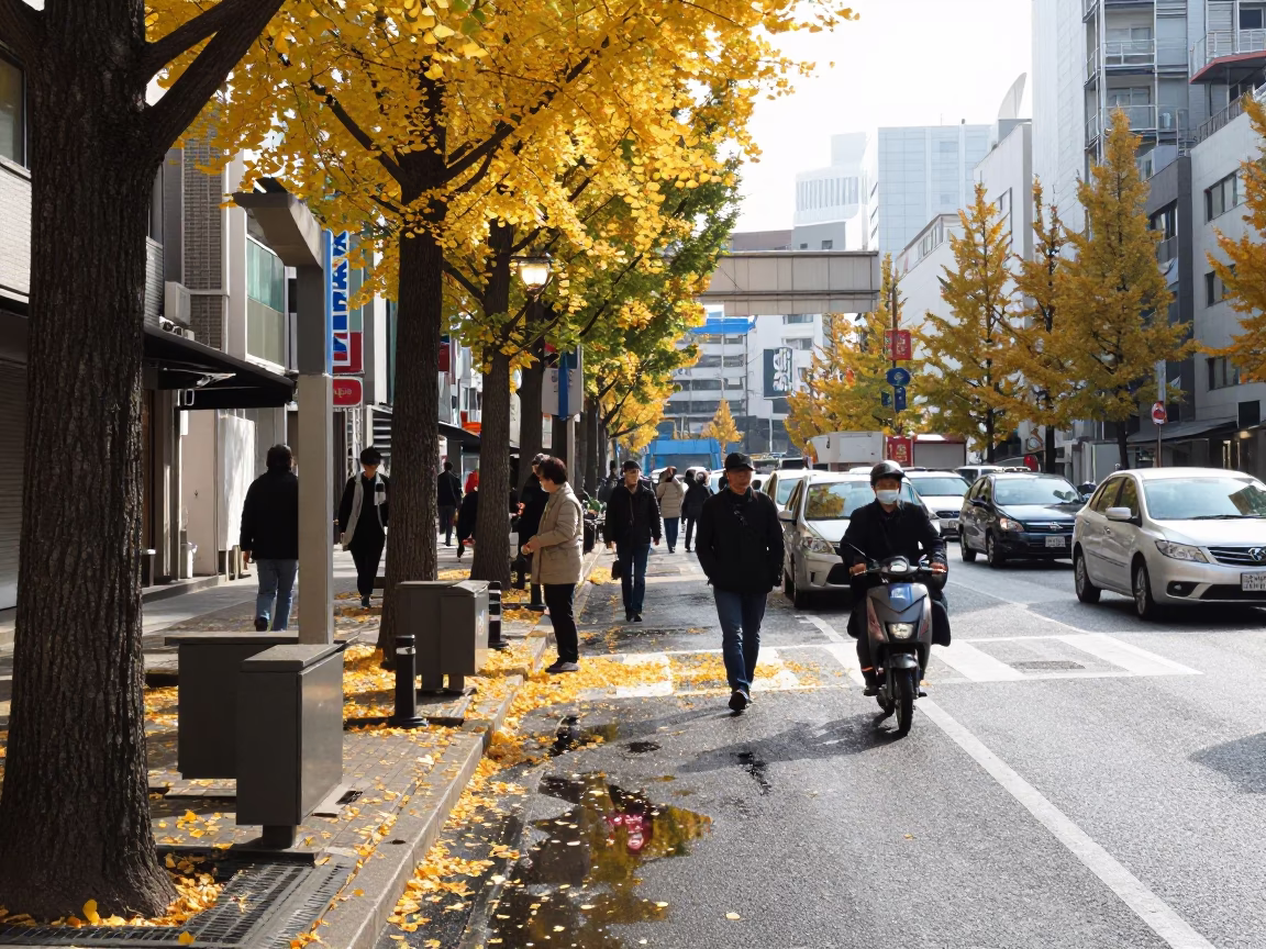 Tokyo Noon Street Scene with Ginkgo Leaves and Construction Sparks in in Tokyo, Japan