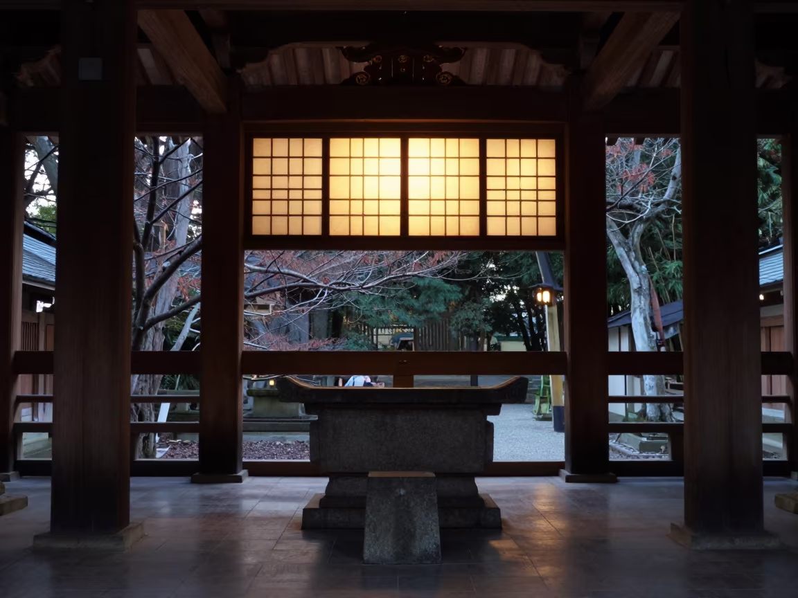 Tokyo Shinto Altar Under Honey Light in at the foot of a stone altar in Tokyo