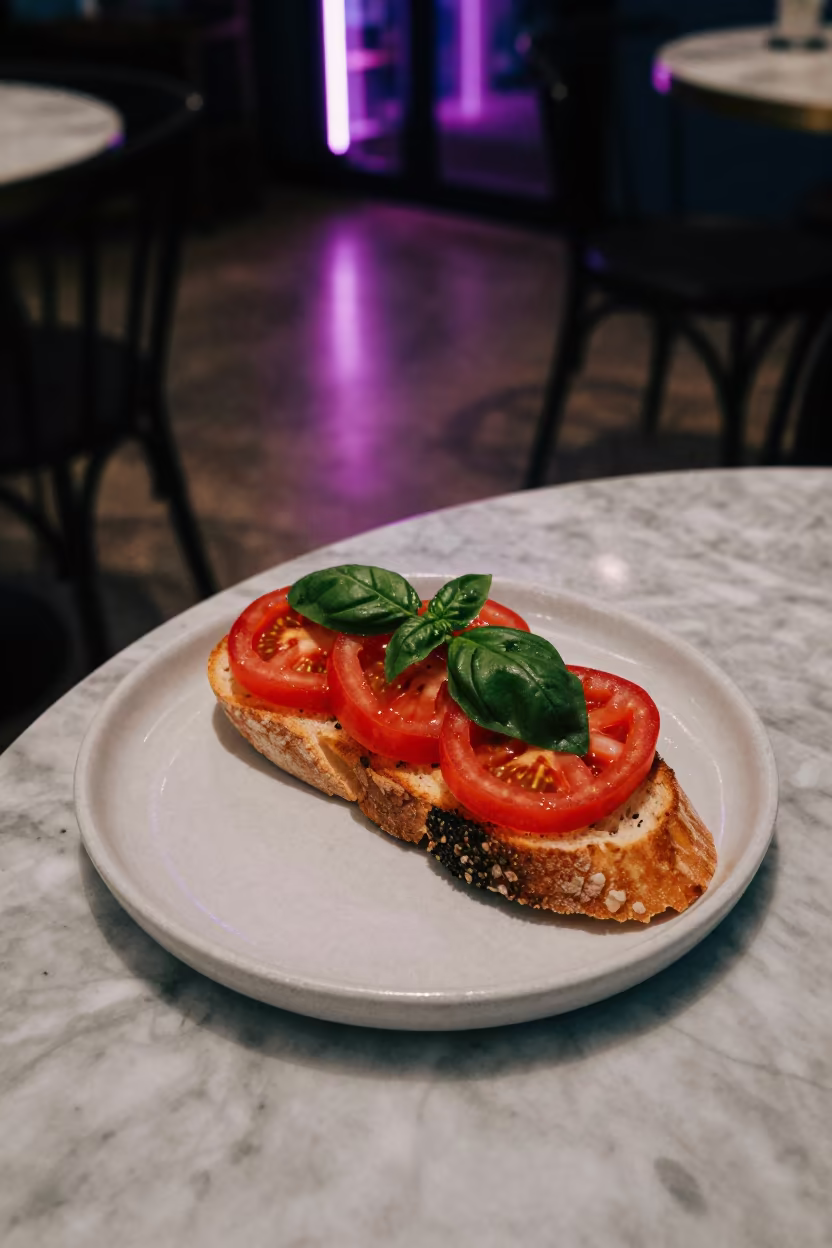 Tomato Bruschetta on Neon Cafe Table in on a marble cafe table in Cameron Highlands