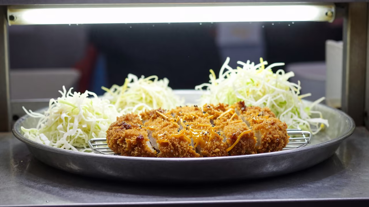 Hot Tonkatsu and Cabbage at Mumbai Market Stall in at a market stall counter in Worli, Mumbai