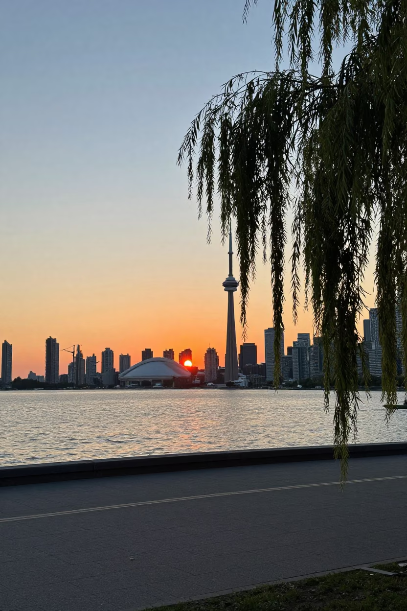 Toronto Harbour Sunset View of Waterfront Promenade and City Skyline in in Toronto, Ontario, Canada