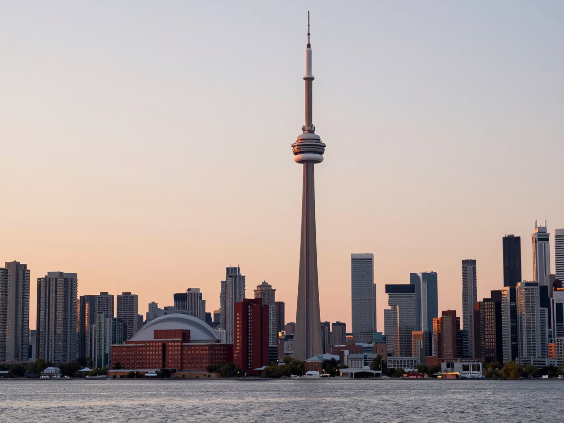 Toronto Lake Ontario Sunset with CN Tower and Distillery District Brick Architecture in in Toronto, Ontario, Canada