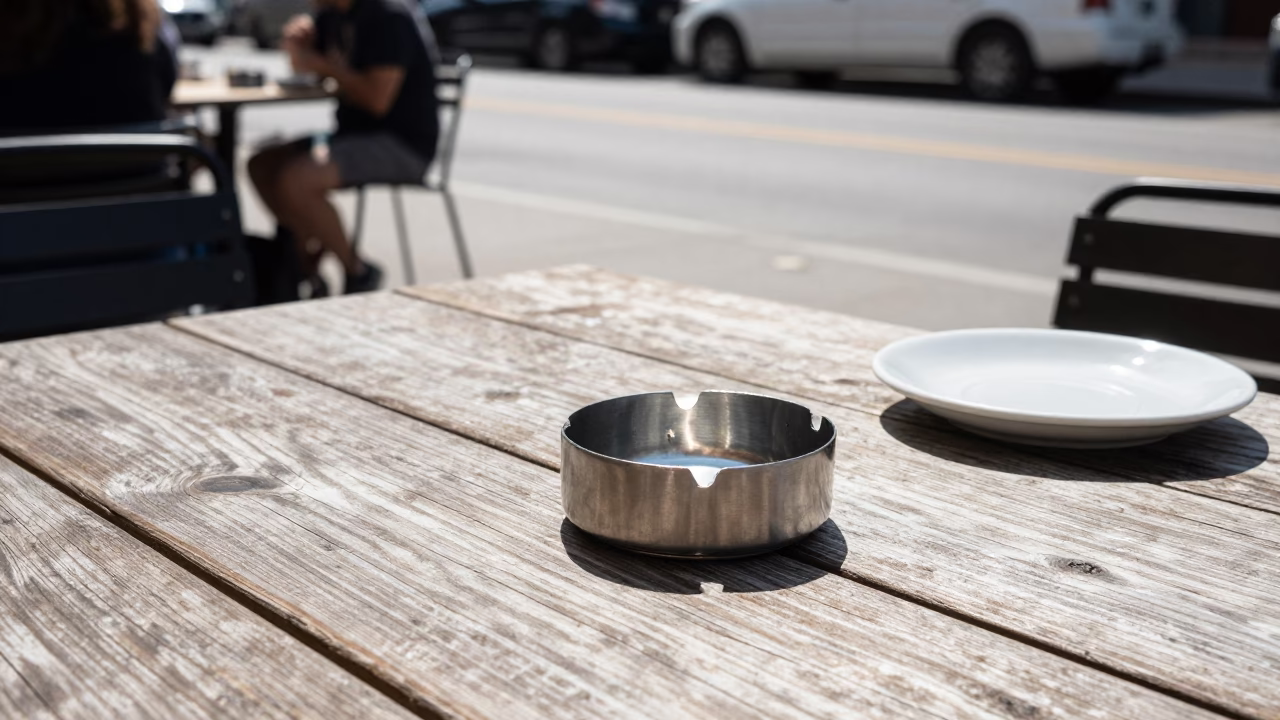 Toronto Noon Street Scene with Ashtray and Saucer on Outdoor Cafe Table in in Toronto, Ontario, Canada