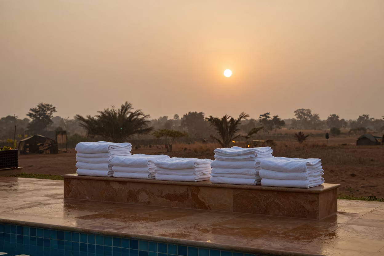Towel Station Under Dual Suns in Kisumu in in a hotel courtyard prepared for dinner in Kisumu