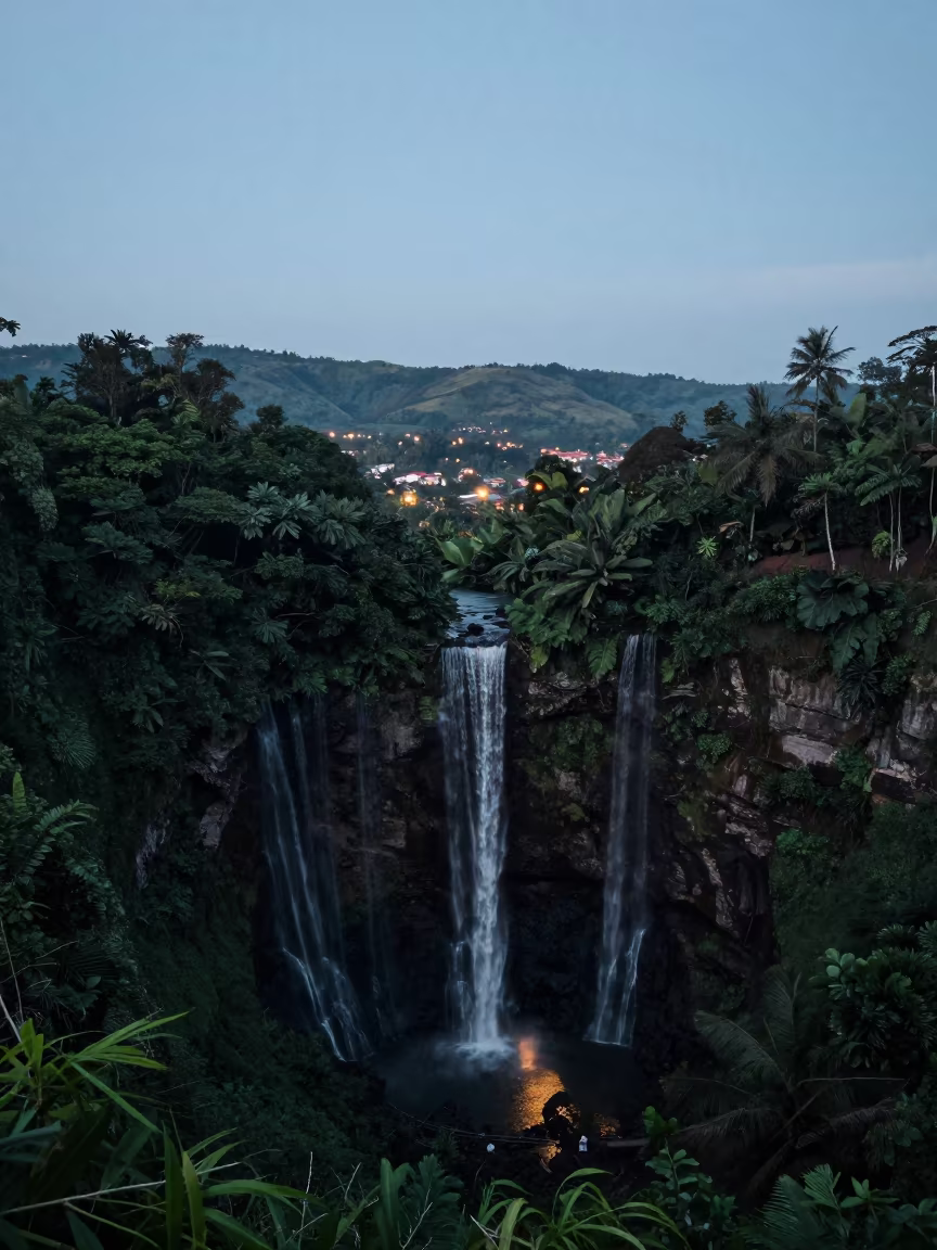 Tropical Waterfall Ridge View Denpasar Dusk in from a ridge above layered foothills near Denpasar