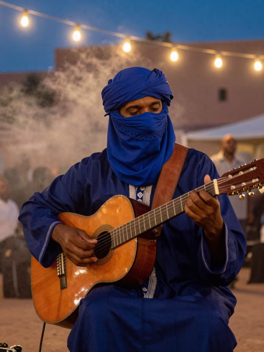 Tuareg Guitarist Twilight Stage Marrakech in on a festival main stage in Marrakech