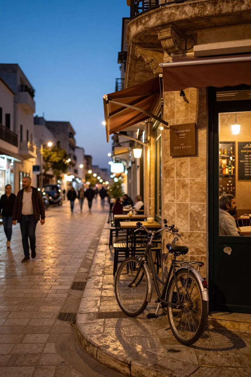 Tunis Tunisia Street Scene at Dusk with Bicycle and Cafe Lights in in Tunis, Tunisia