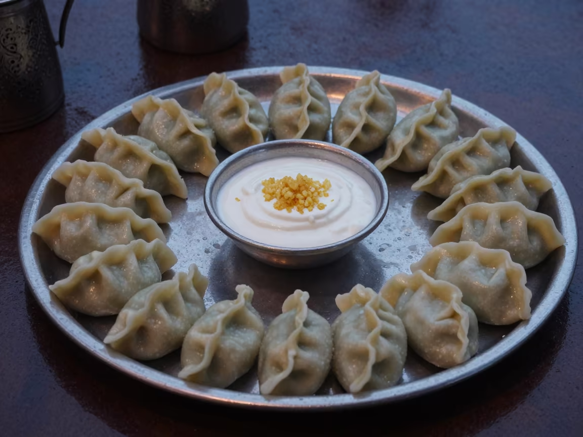 Turkish Manti Dumplings with Yogurt on Tray in on a tea house tray in Milagro