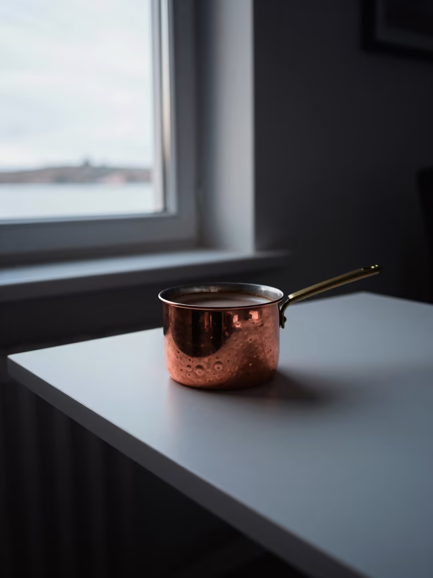 Turkish Mocha Copper Pot on Helsinki Desk in on a writing desk near Helsinki