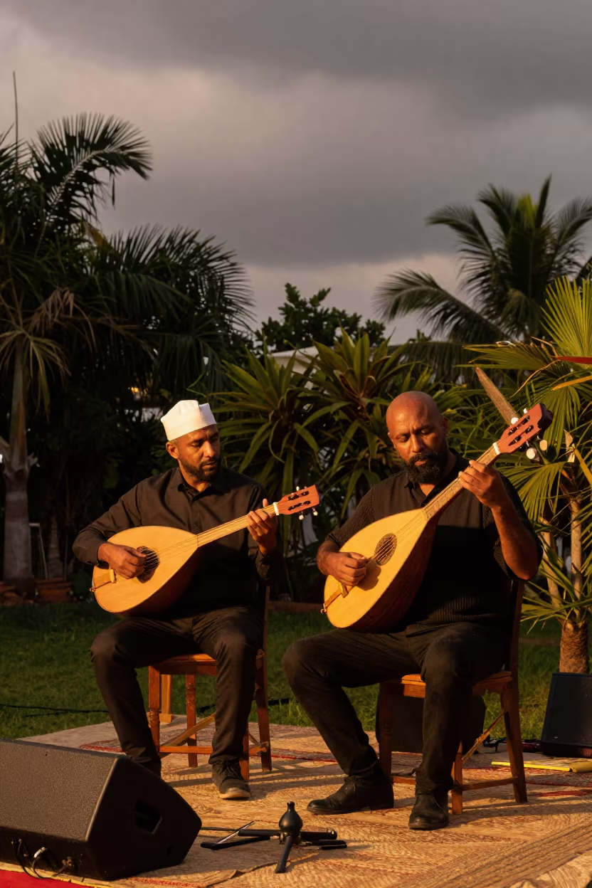 Turkish Oud Kanun Duo Lagos Garden Stage in on a dimly lit stage in Lagos
