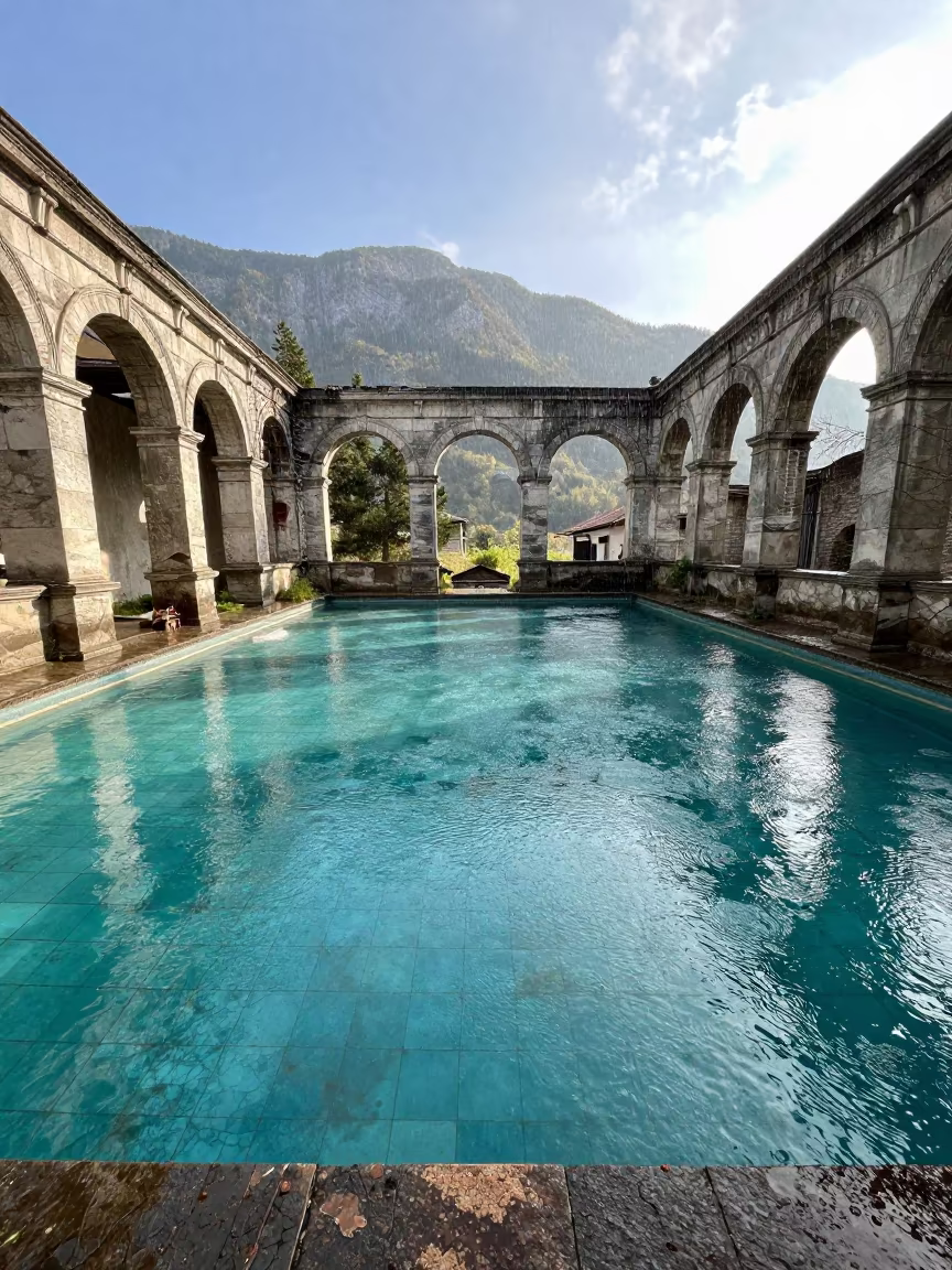 Turquoise Tile Pool Amidst Graz Cloister Ruins in among collapsed cloisters near Graz