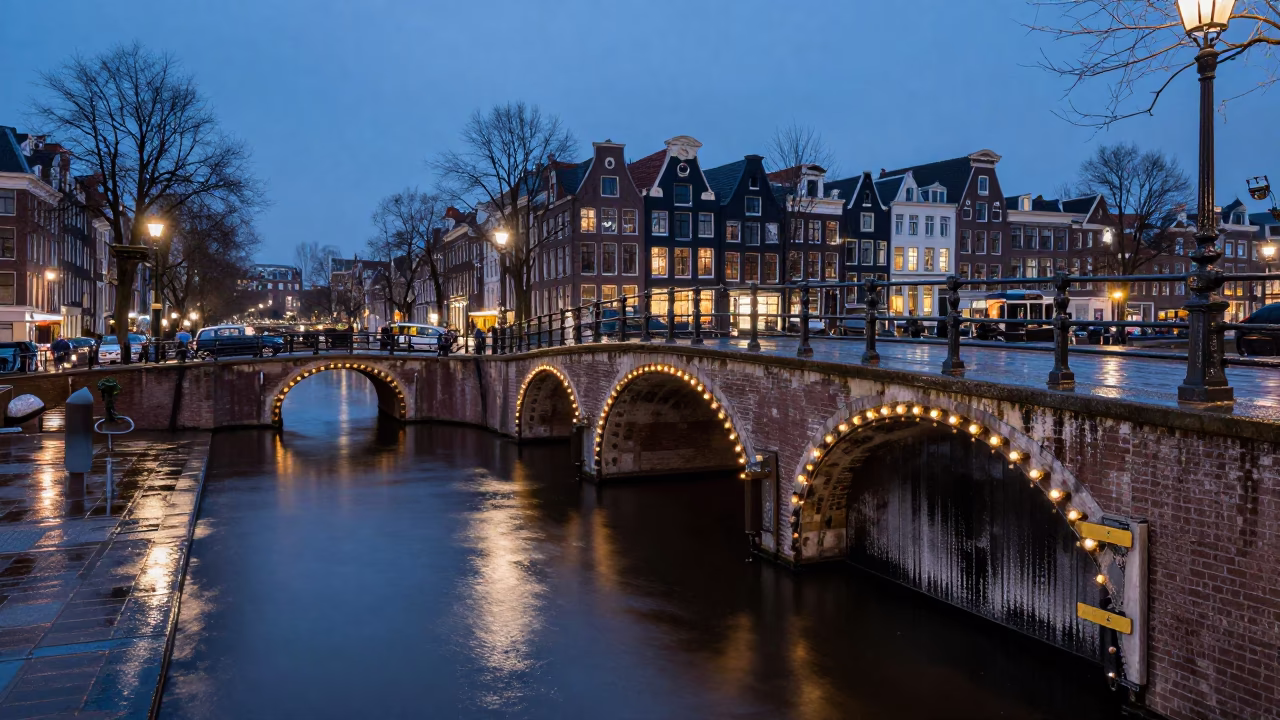 Twilight Canal Scene in Amsterdam Netherlands with Bridge Pier and Wet Latch Details in in Amsterdam, Netherlands