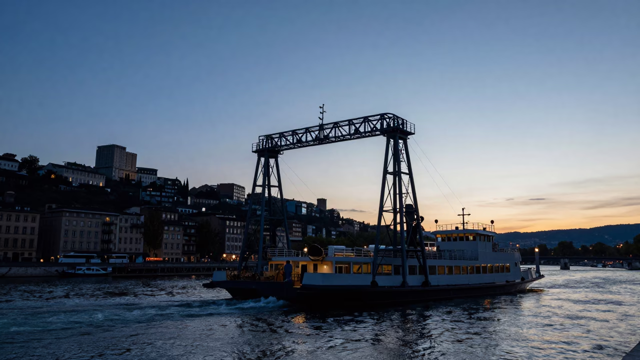 Twilight Chain Ferry Crossing the Rhone River in Lyon France in in Lyon, France