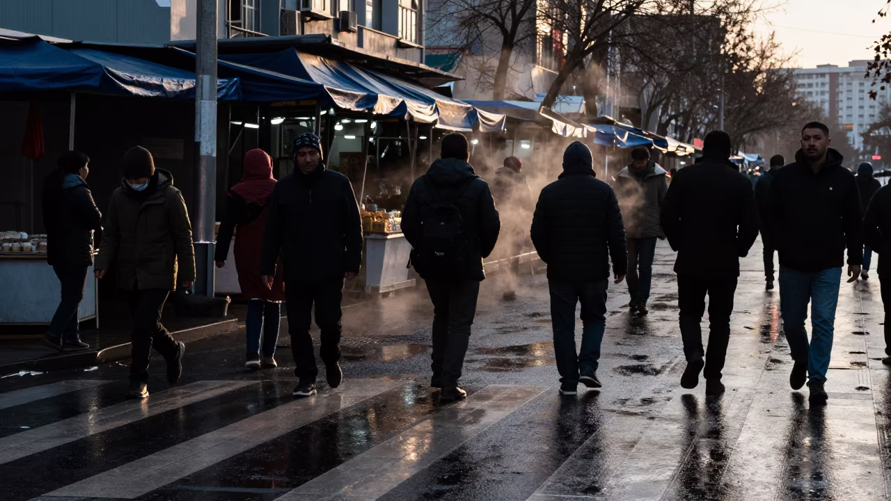 Twilight Commuters on Rainy Ulaanbaatar Street in along a market-lined side street in Ulaanbaatar