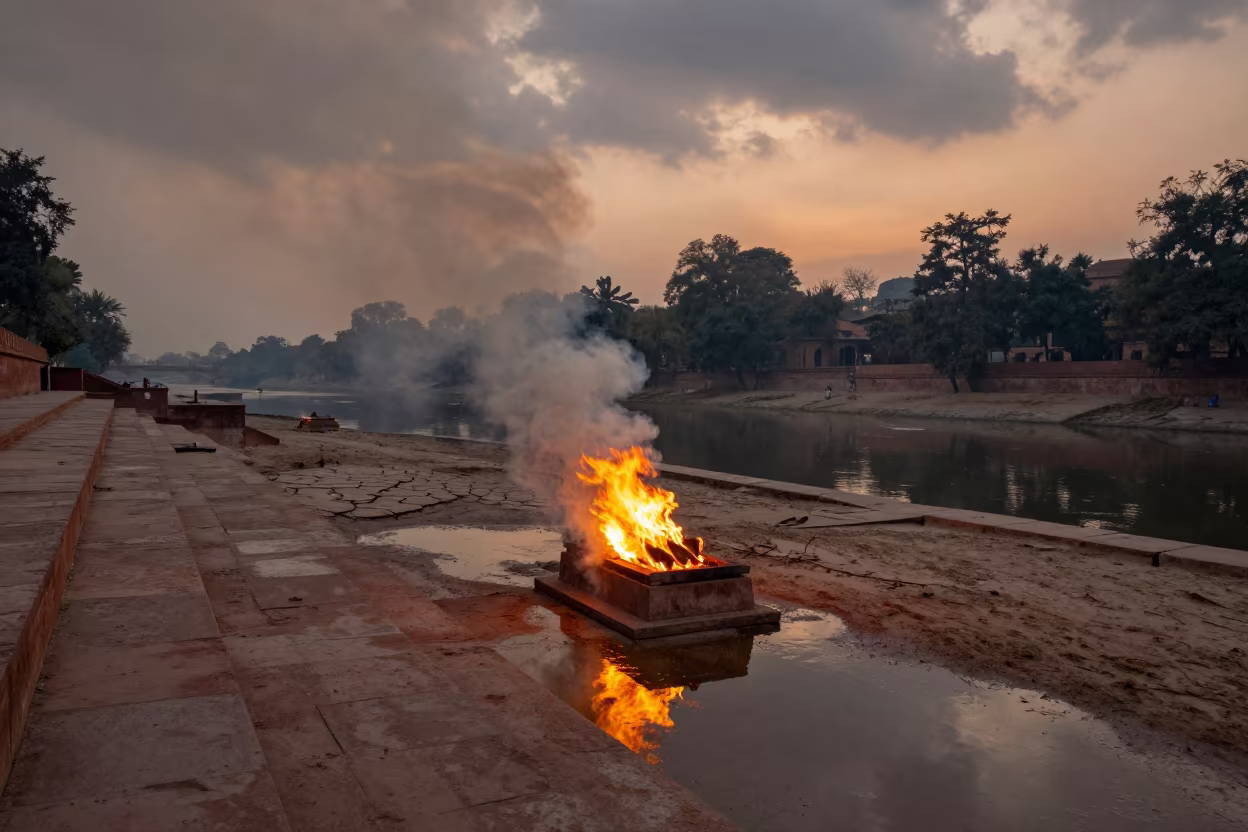 Twilight Funeral Pyre Smoke Over Delhi Ghats in in a cloister garden in Delhi