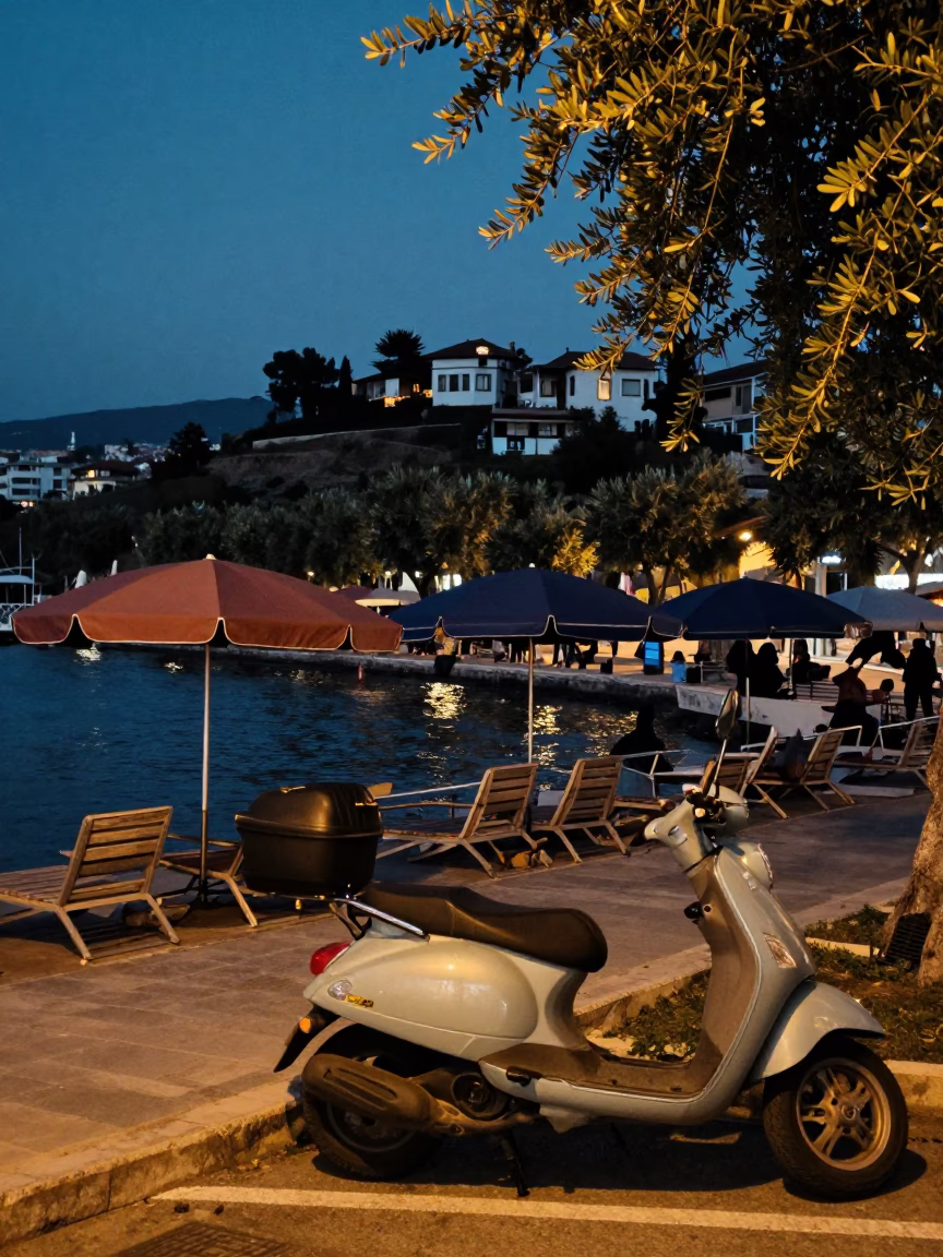 Twilight Harbor Scene in Izmir Turkey with Scooter and Umbrellas in in Izmir, Turkey