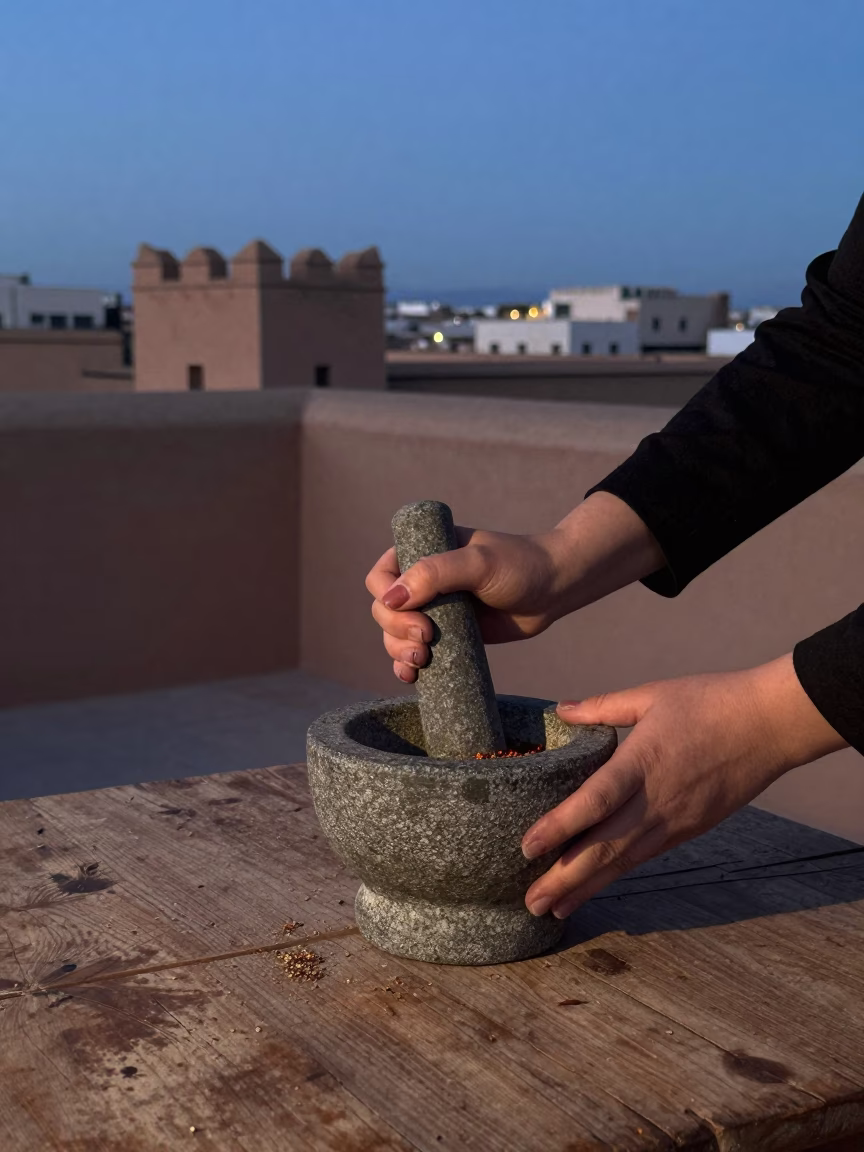 Twilight in Essaouira Morocco with Mortar and Pestle on Wooden Table in in Essaouira, Morocco
