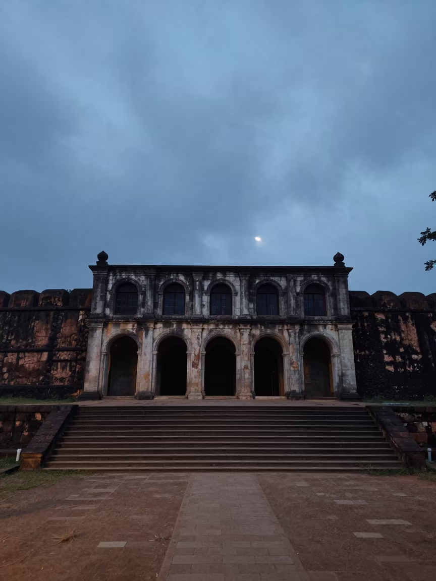 Twilight Library Facade Beside Steps in outside a wind-scoured fortress wall in Sri Lanka