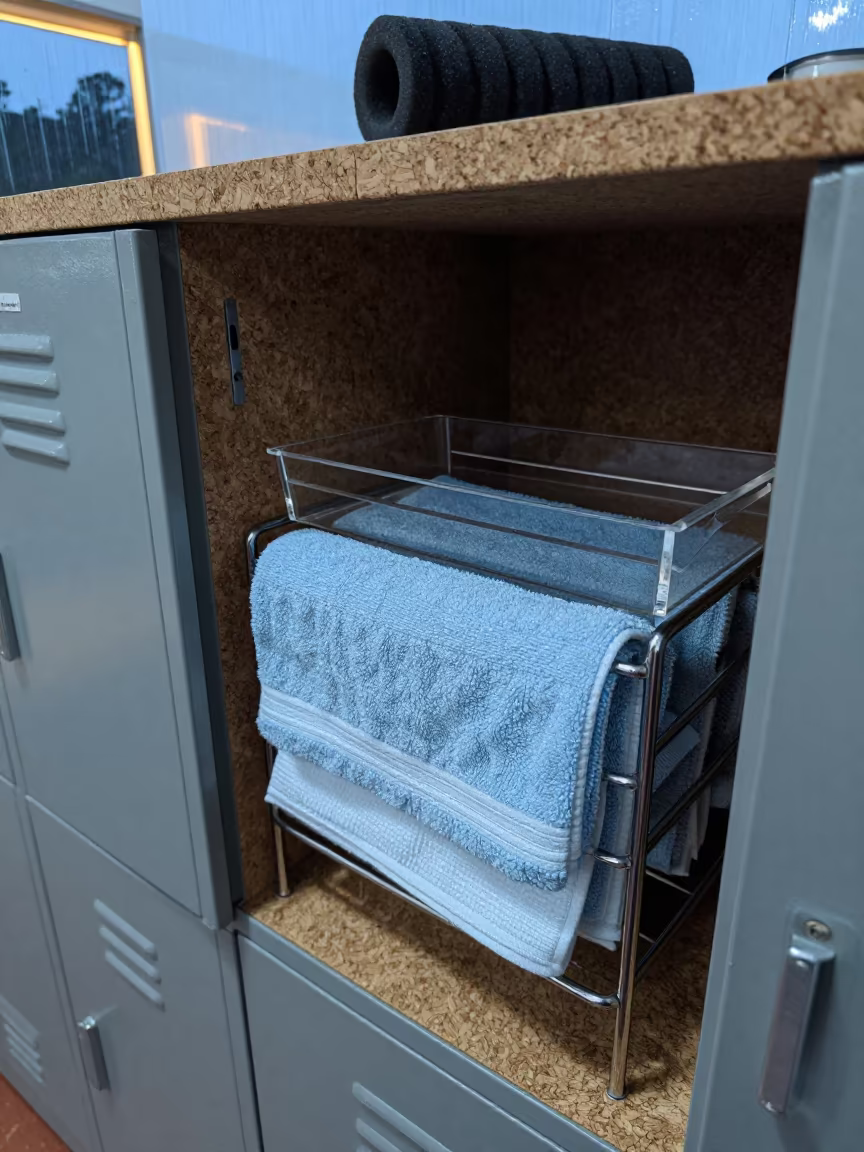 Twilight Locker Rack Cork Dust Huambo in inside a recovery lounge beside foam rollers in Huambo