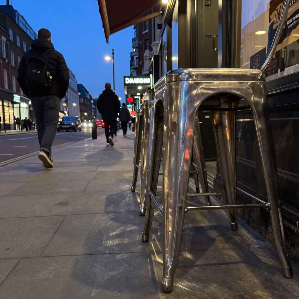 Twilight London Street Scene with Reflections on Brushed Steel and Urban Life in in London, United Kingdom