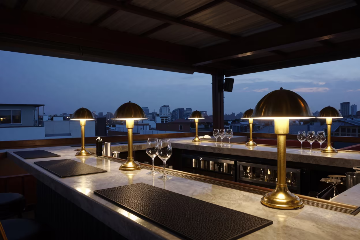 Twilight Lounge with Heat Lamps and Skyline Reflections in inside a hotel lobby near Chimbote