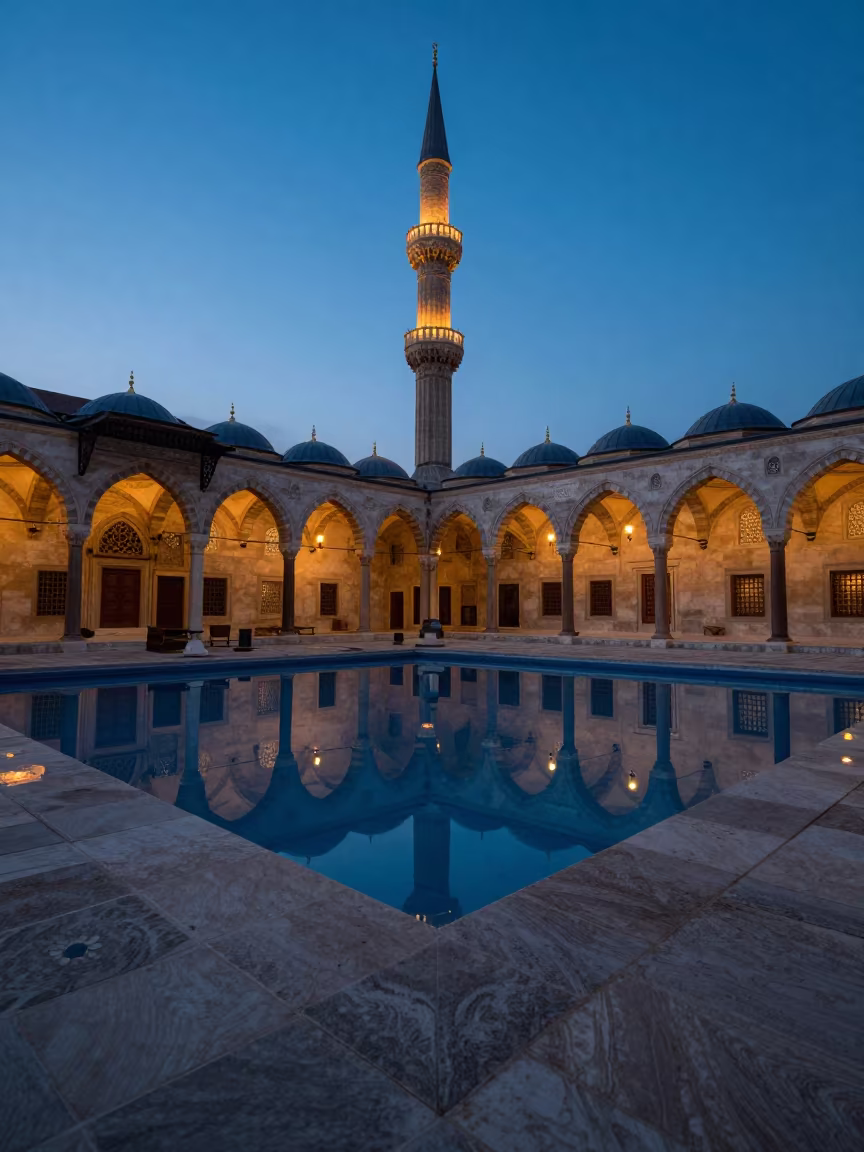 Twilight Reflection of Minaret in Mosque Pool in beneath a pagoda roof in Dubai