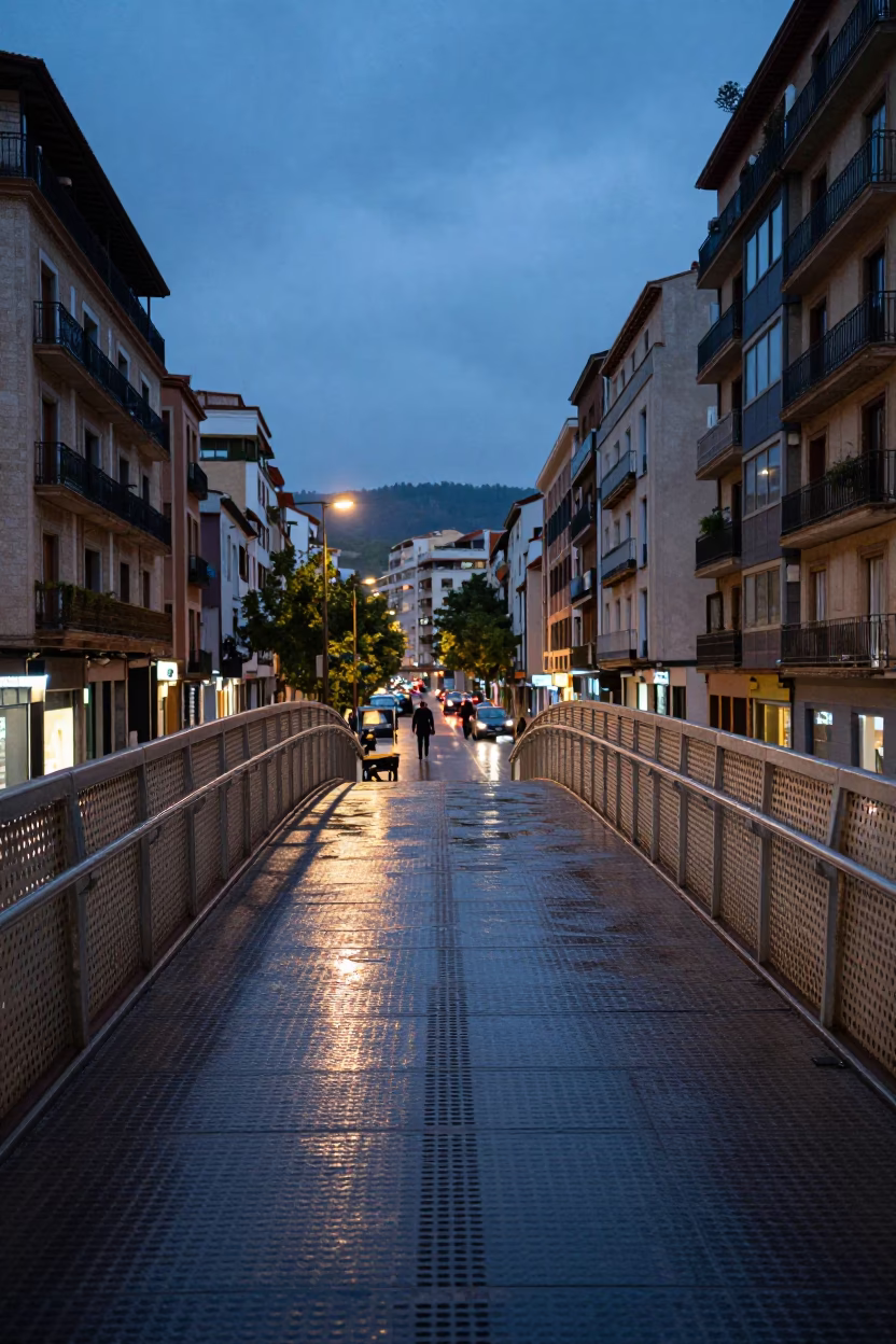 Twilight Pedestrian Overpass in Bilbao Spain with Wet Footsteps and Urban Architecture in in Bilbao, Spain