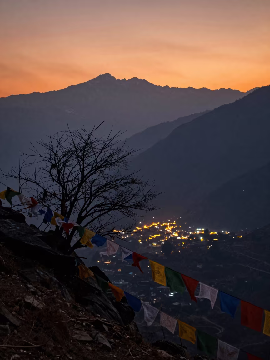 Twilight Prayer Flags Silhouetted Over Kathmandu Valley in along a high mountain pass beneath prayer flags near Kathmandu