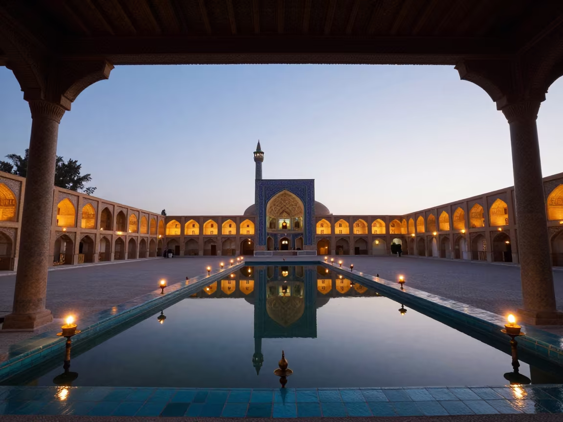 Twilight Reflection of Minaret in Mosque Pool in beneath a pagoda roof near Isfahan