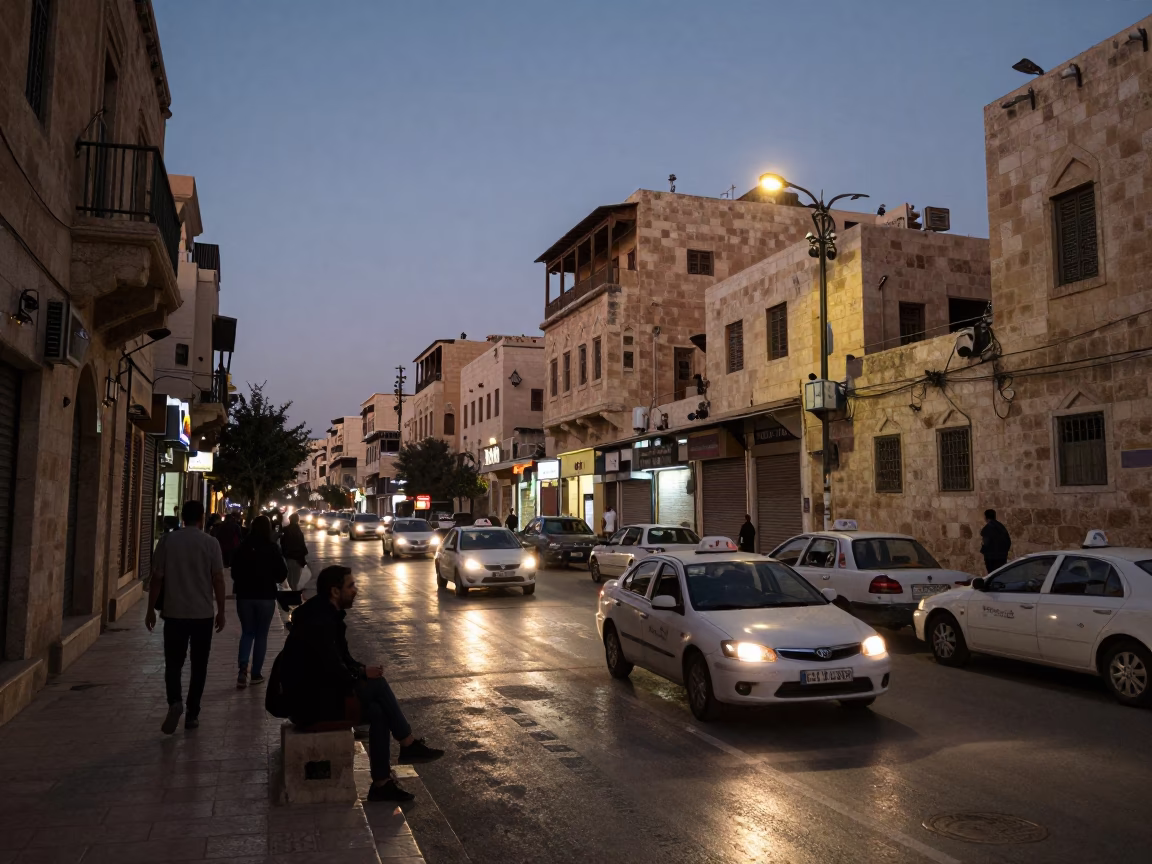 Twilight Street Scene in Amman Jordan with Limestone Architecture and Busy Traffic in in Amman, Jordan
