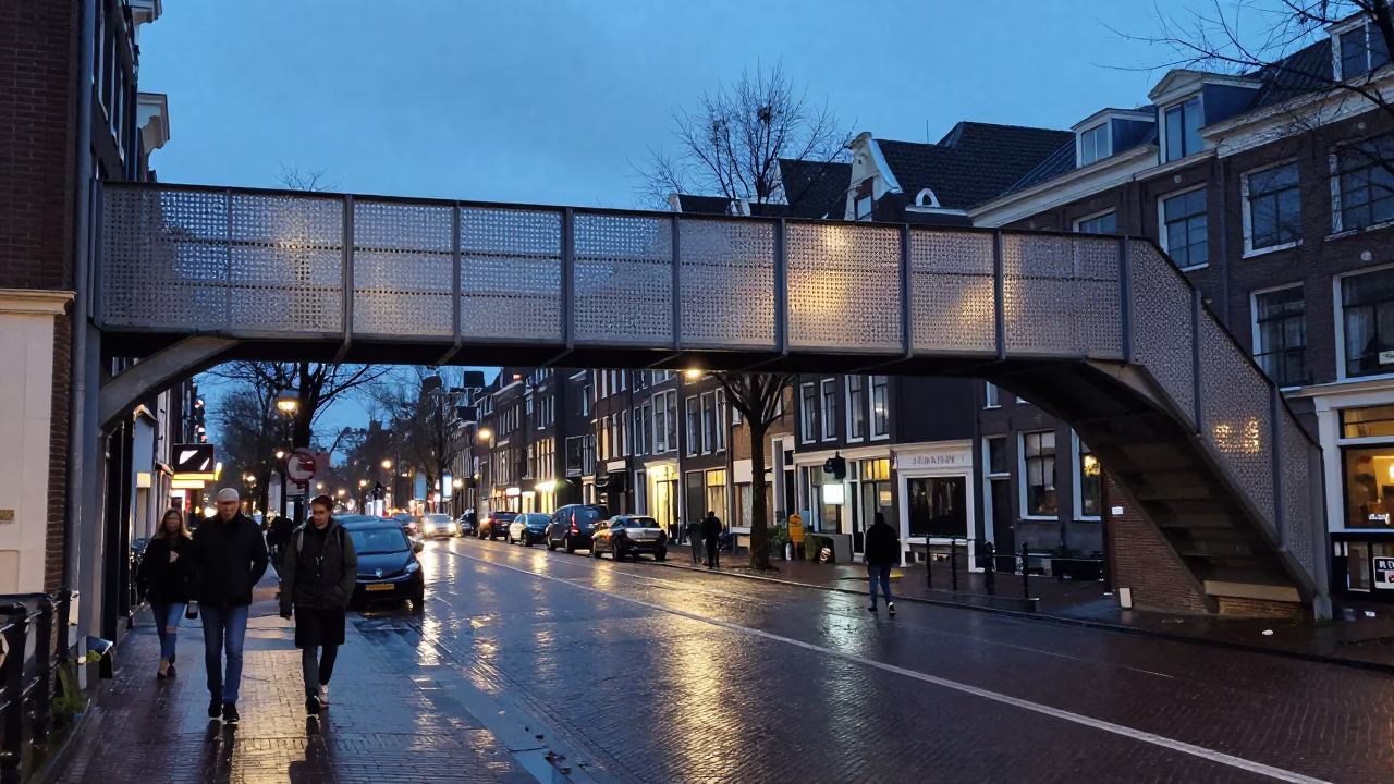 Twilight Street Scene in Amsterdam Netherlands with Pedestrian Overpass and Wet Footsteps in in Amsterdam, Netherlands