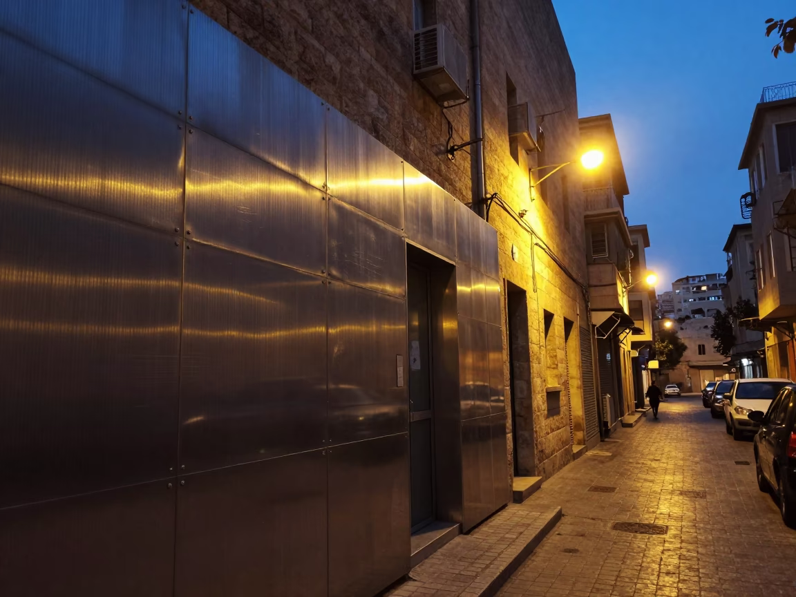 Twilight Street Scene in Beirut Lebanon with Brushed Steel Wall and Latch Detail in in Beirut, Lebanon