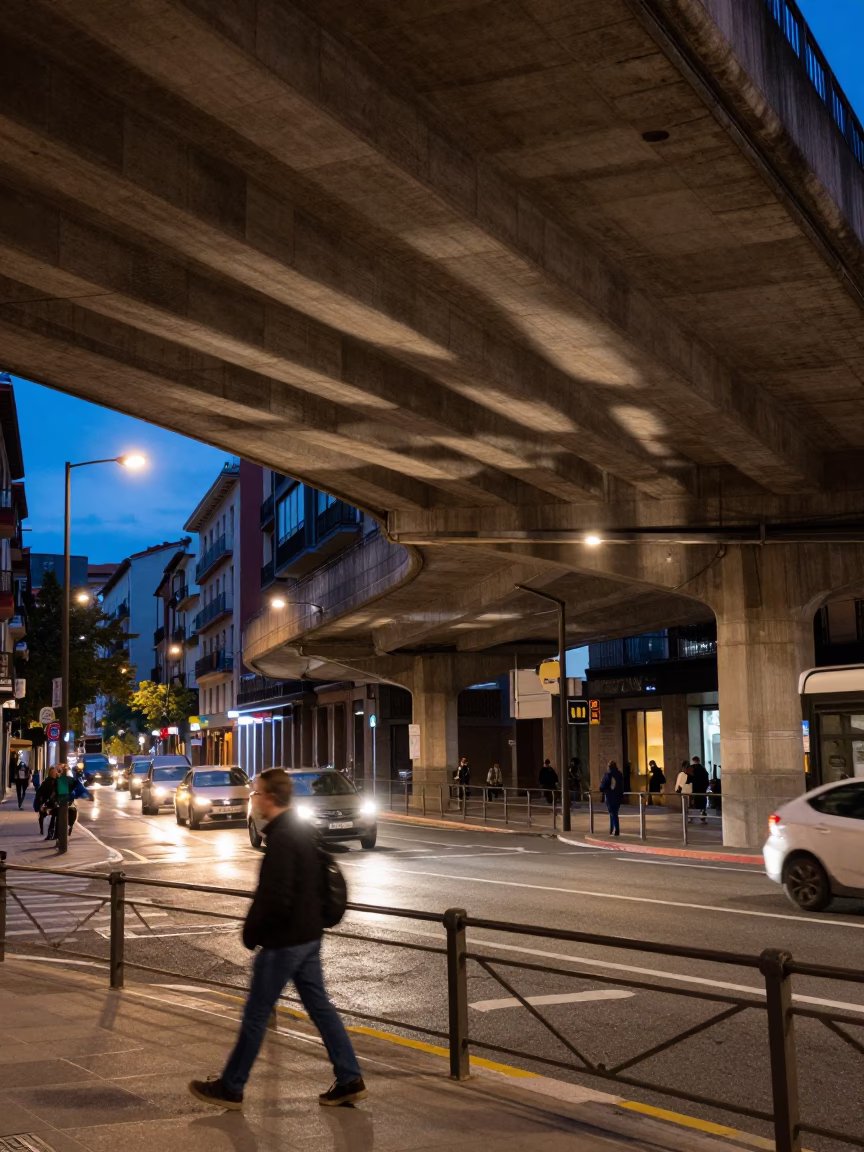 Twilight Street Scene in Bilbao Spain Featuring Overhead Flyover Shadows and Urban Architecture in in Bilbao, Spain